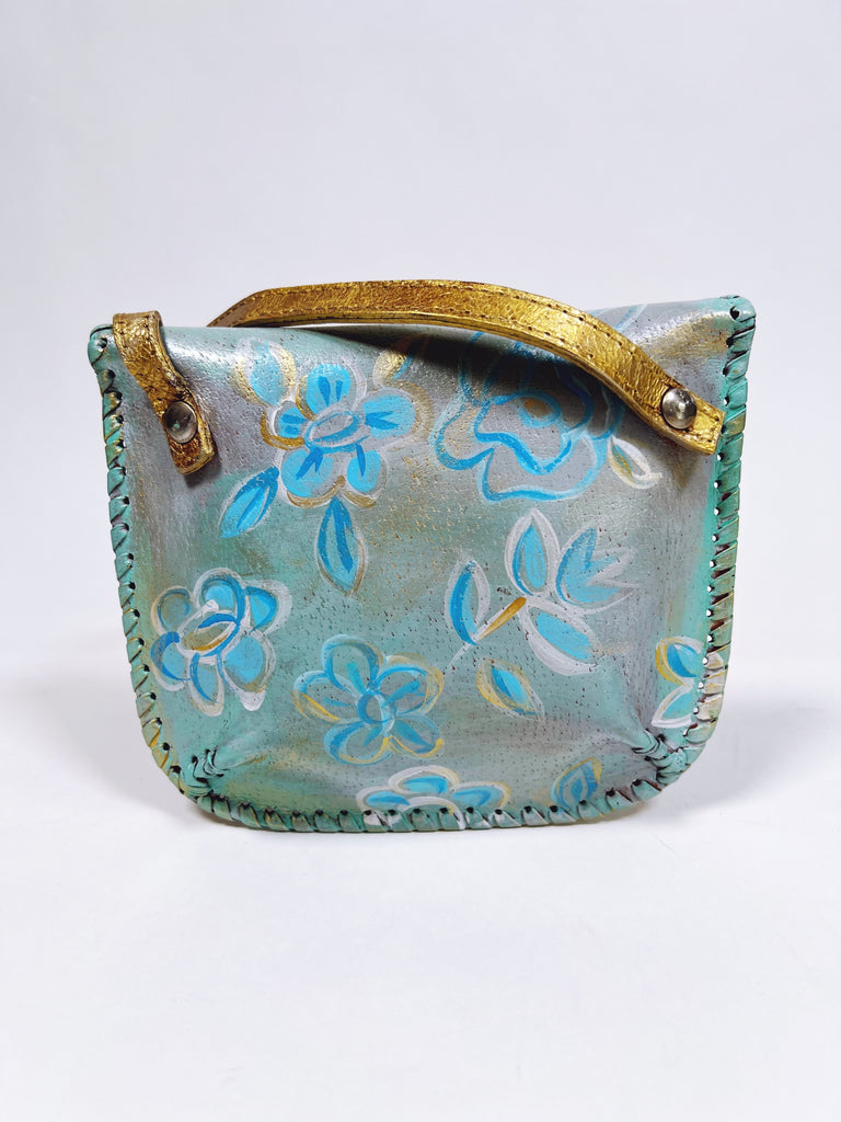 Up cycled, hand-painted real leather crossbody micro bag in ocean blue by Mer Rose Atelier.
