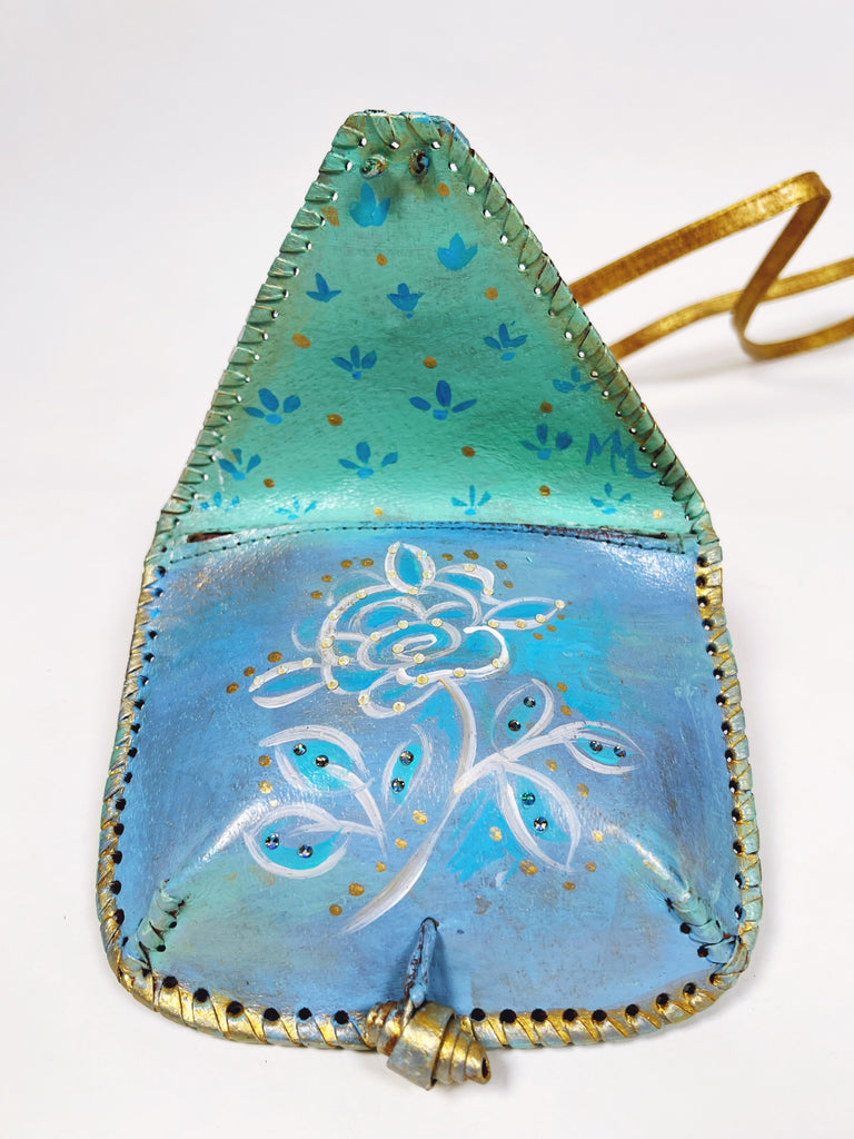 Up cycled, hand-painted real leather crossbody micro bag in ocean blue by Mer Rose Atelier.
