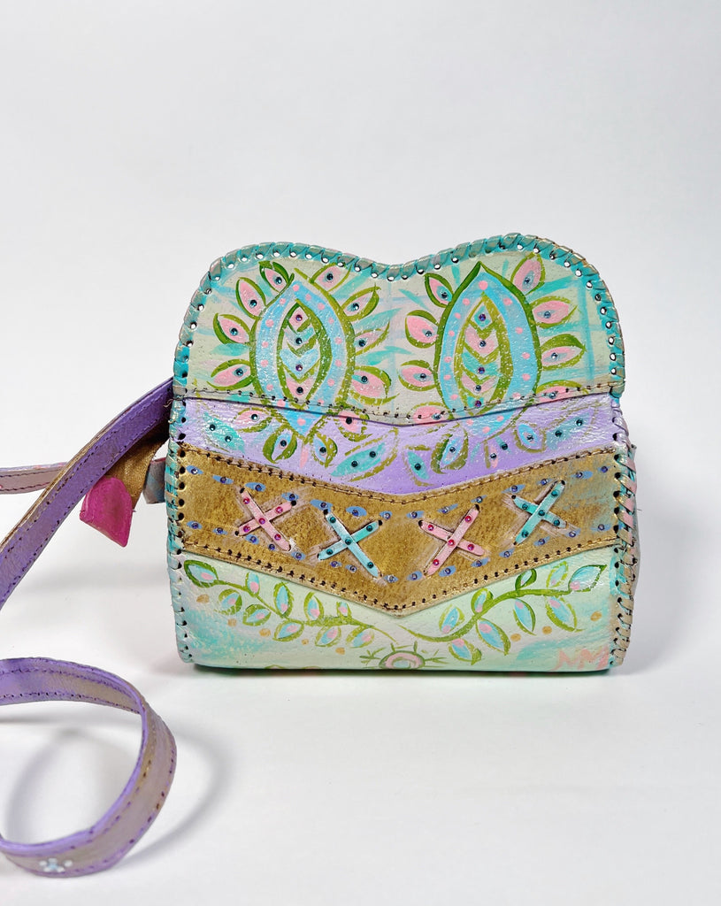 Hand painted, up cycled real leather handbag in pastel colors by Mer Rose Atelier