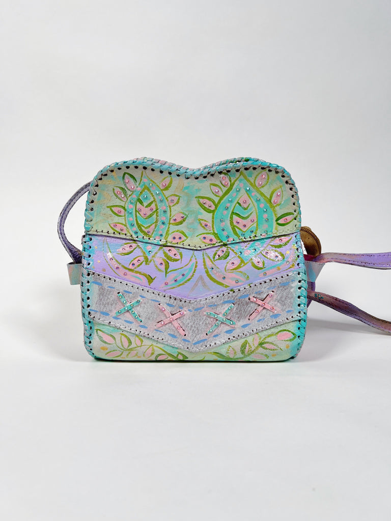 Hand painted, up cycled real leather handbag in pastel colors by Mer Rose Atelier