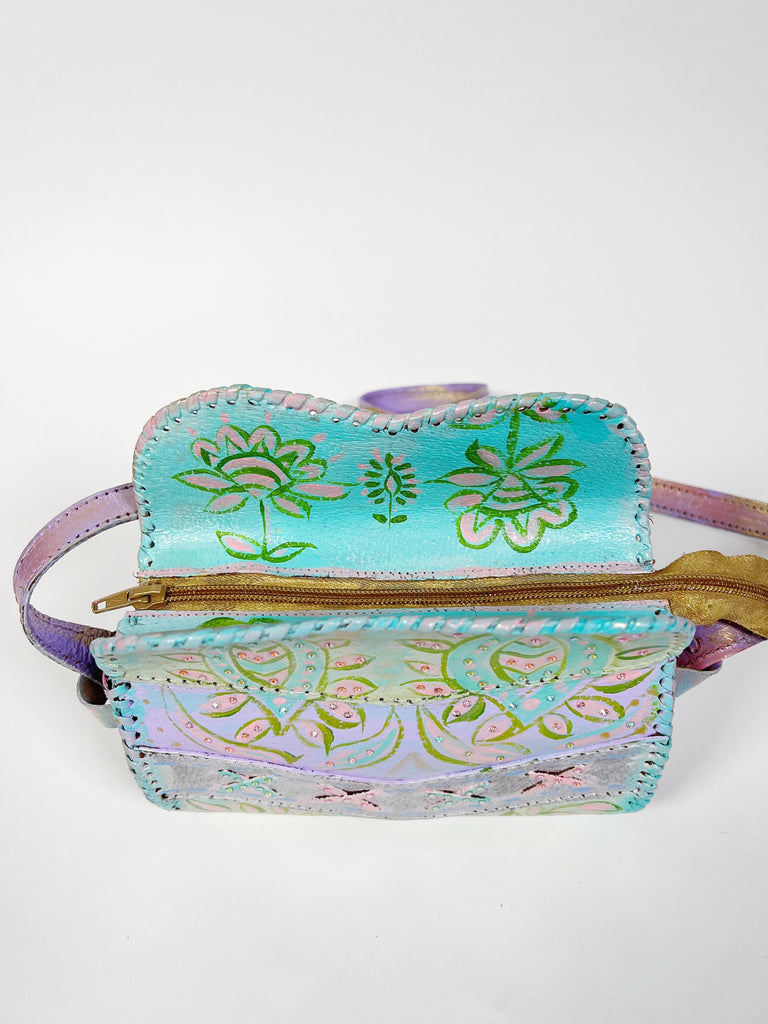 Hand painted, up cycled real leather handbag in pastel colors by Mer Rose Atelier