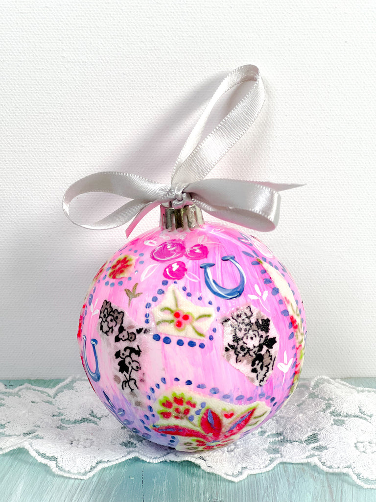 Pretty hand painted, one-of-a-kind holiday Christmas ornaments available to shop on Mer Rose Atelier