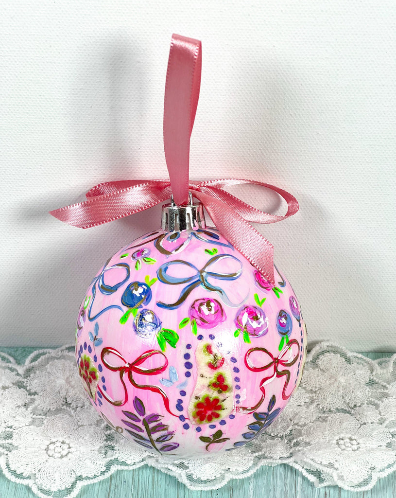 Pretty hand painted, one-of-a-kind holiday Christmas ornaments available to shop on Mer Rose Atelier