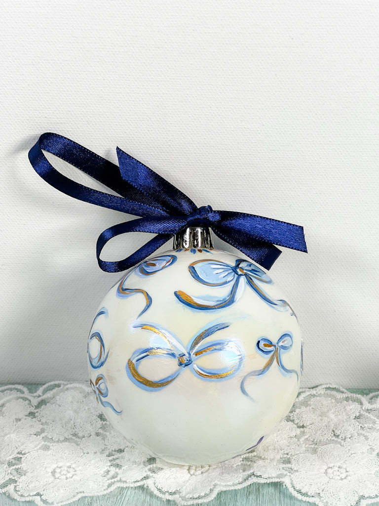 Pretty hand painted, one-of-a-kind holiday Christmas ornaments available to shop on Mer Rose Atelier