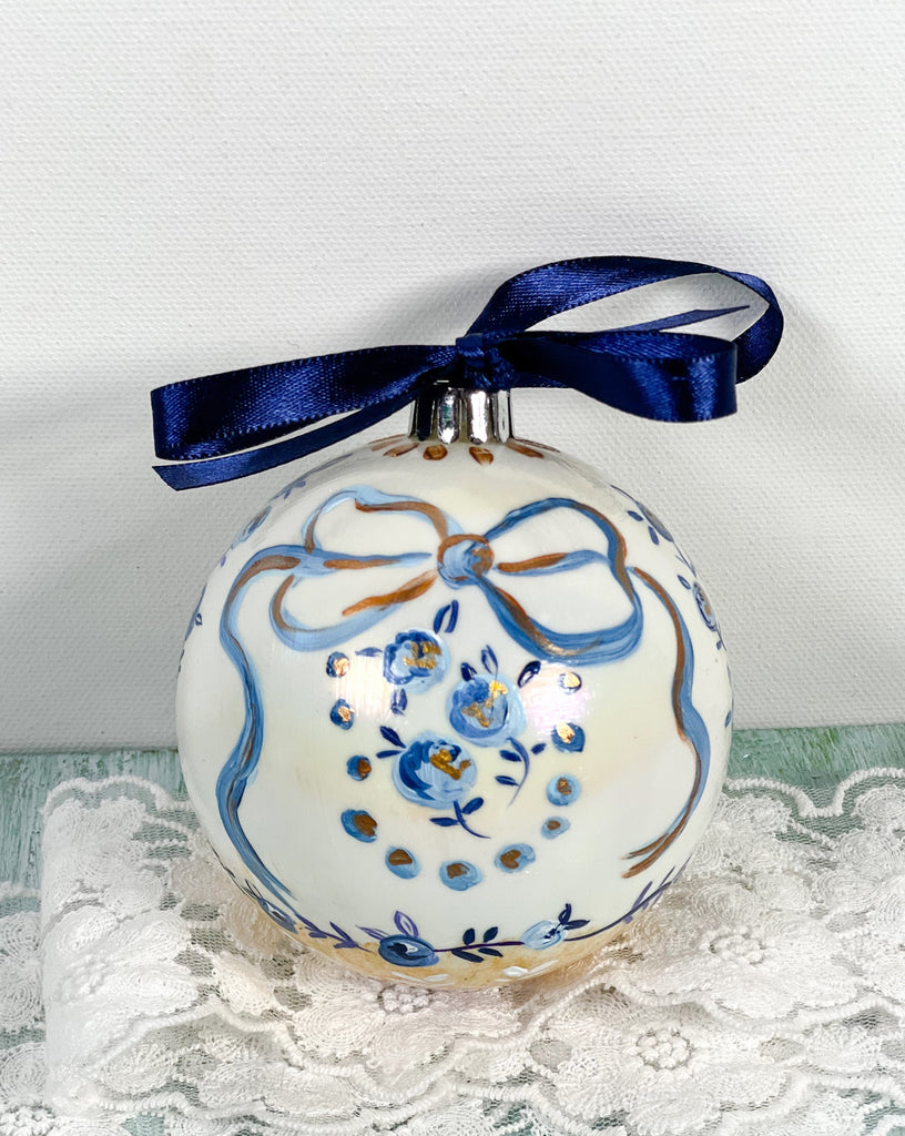 Pretty hand painted, one-of-a-kind holiday Christmas ornaments available to shop on Mer Rose Atelier