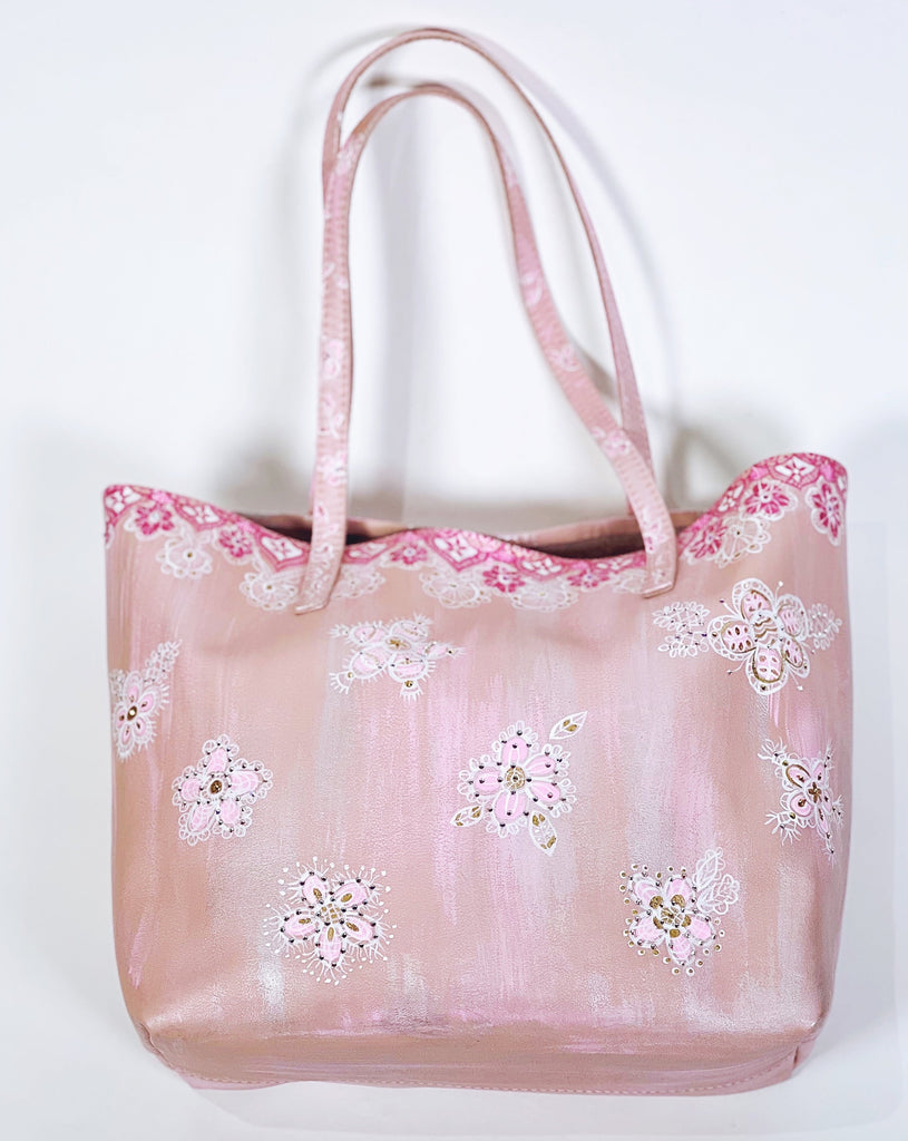 Mer Rose Atelier Colette pink tote bag hand painted with a lace pattern.
