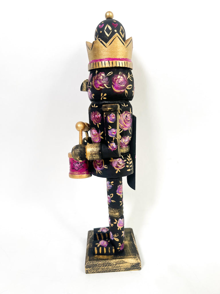 A beautiful addition to your holiday table decor or mantle. The Rose & Noir Nutcracker is a treasure for years to come!