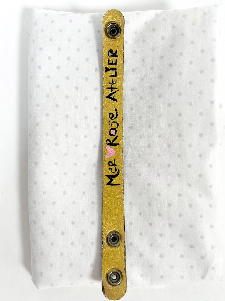 This sweet hand painted bracelet is perfect on it's own and also wonderful paired with fine jewelry