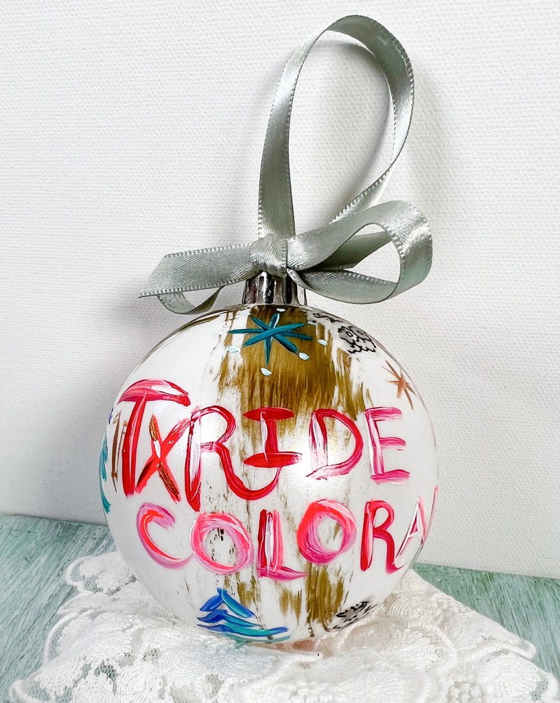 Pretty hand painted, one-of-a-kind holiday Christmas ornaments available to shop on Mer Rose Atelier