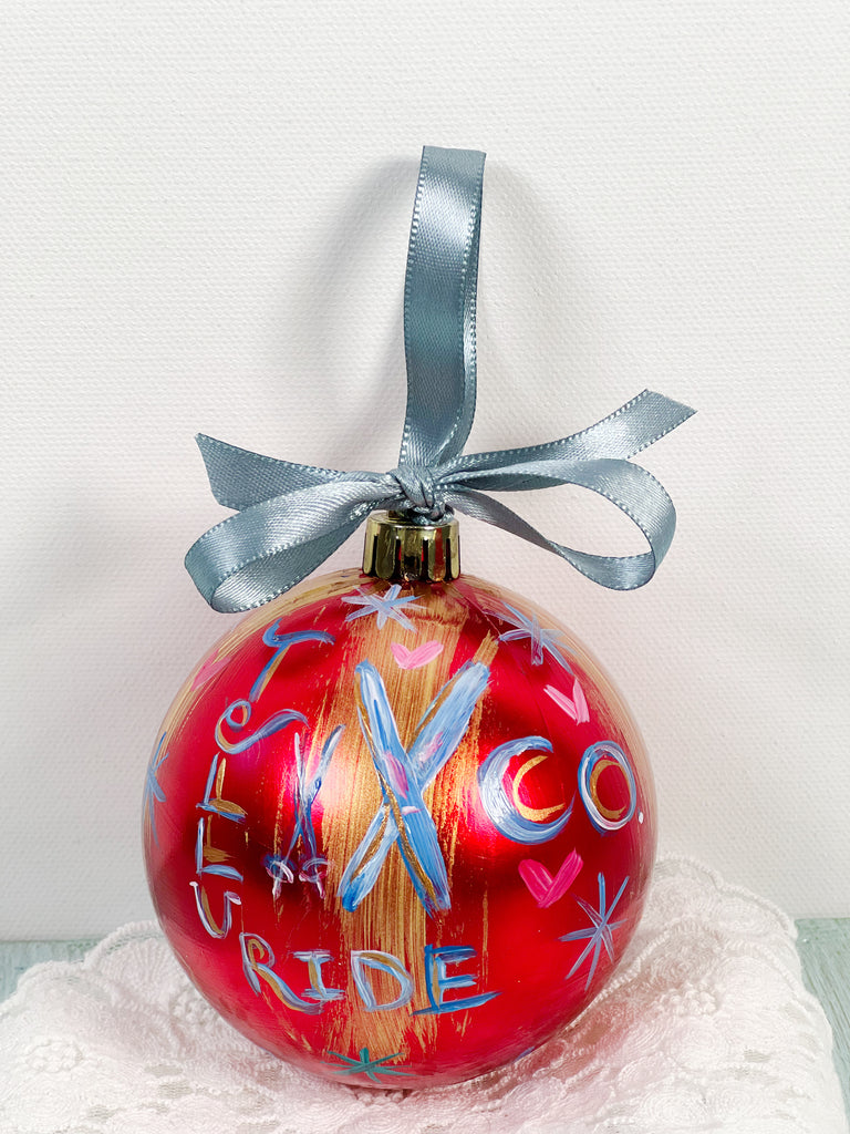 Pretty hand painted, one-of-a-kind holiday Christmas ornaments available to shop on Mer Rose Atelier