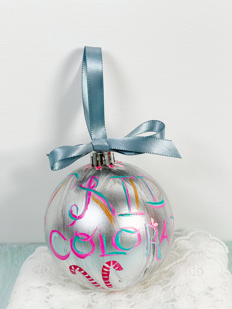 Pretty hand painted, one-of-a-kind holiday Christmas ornaments available to shop on Mer Rose Atelier