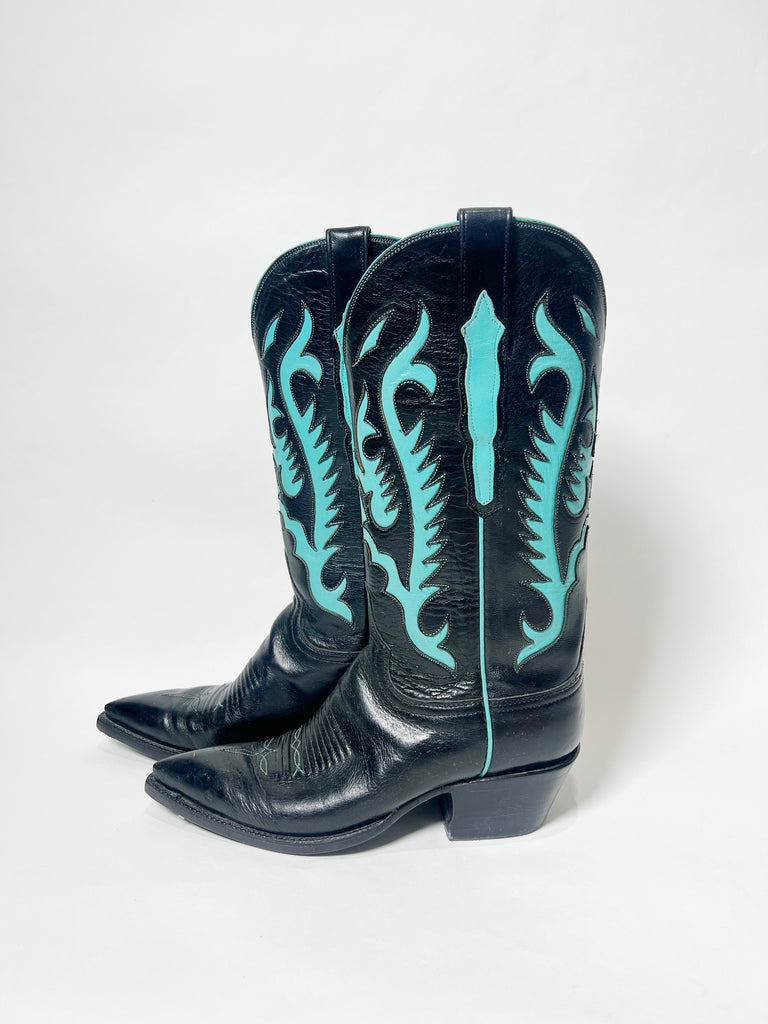 One-of-a-kind, hand painted Mer Rose Atelier cowboy boots are the ultimate fashion statement. 