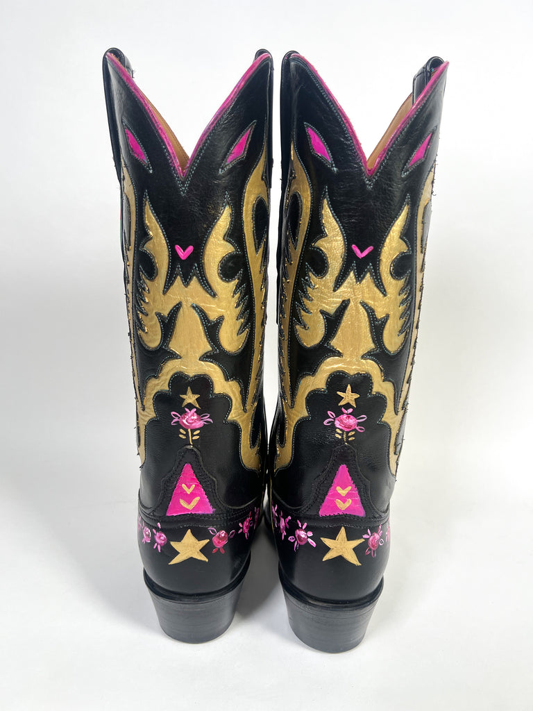 One-of-a-kind, hand painted Mer Rose Atelier cowboy boots are the ultimate fashion statement. 