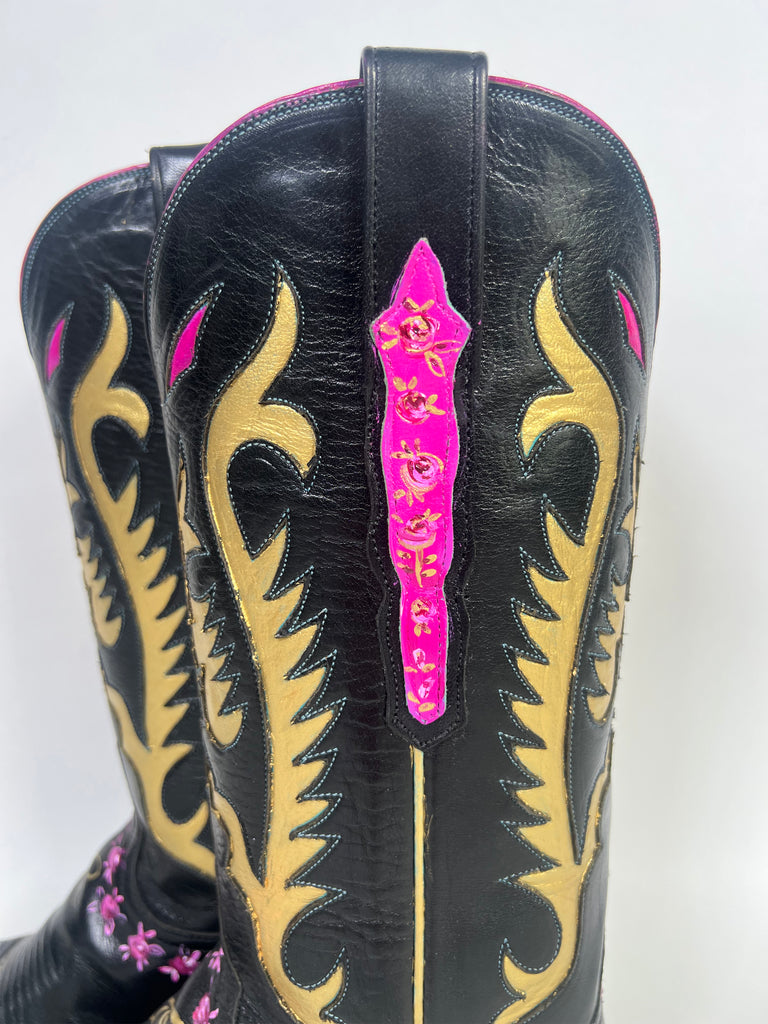 One-of-a-kind, hand painted Mer Rose Atelier cowboy boots are the ultimate fashion statement. 