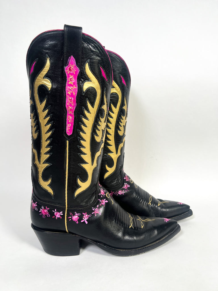 One-of-a-kind, hand painted Mer Rose Atelier cowboy boots are the ultimate fashion statement. 