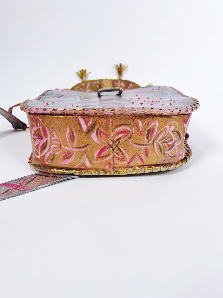 Pretty Stella is a hand painted, up cycled, one of a kind, luxury  leather handbag