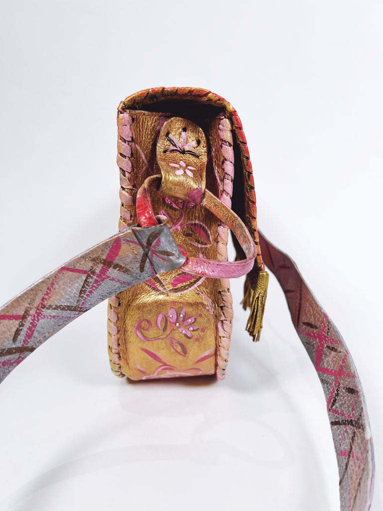 Pretty Stella is a hand painted, up cycled, one of a kind, luxury  leather handbag