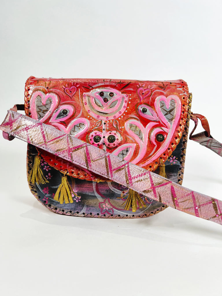 Pretty Stella is a hand painted, up cycled, one of a kind, luxury  leather handbag