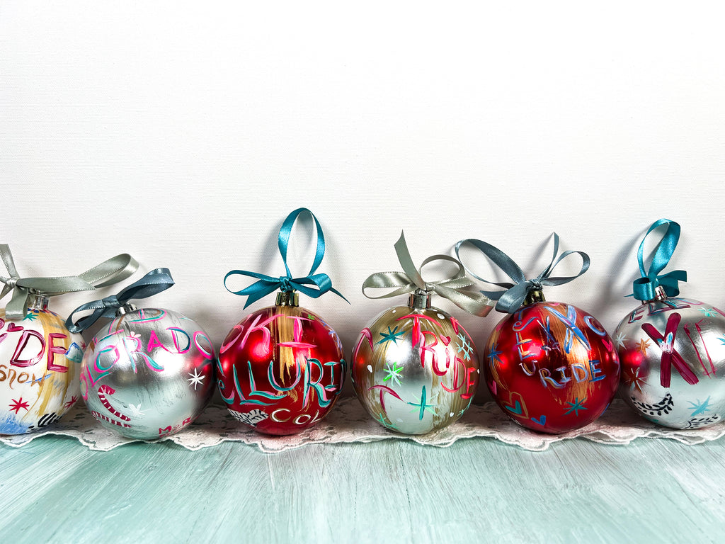 Pretty hand painted, one-of-a-kind holiday Christmas ornaments available to shop on Mer Rose Atelier